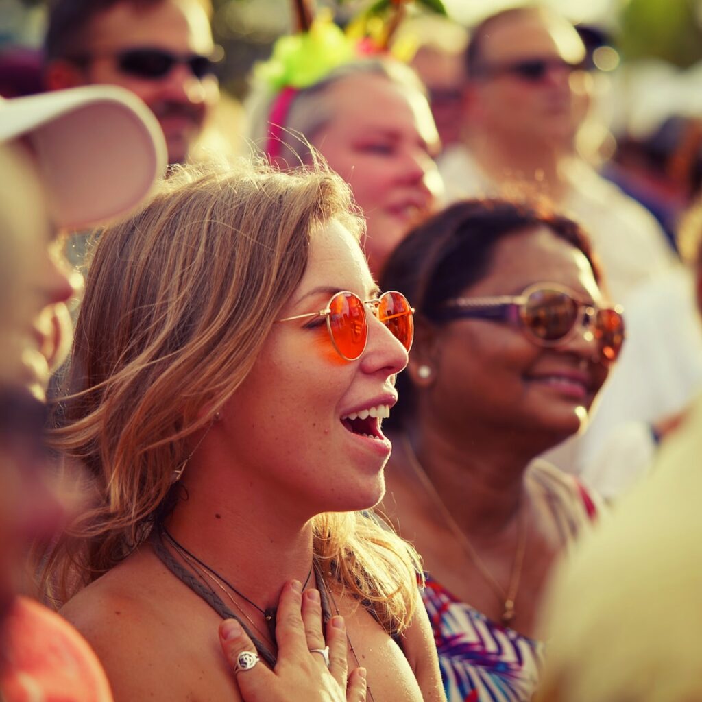 woman wearing red sunglasses